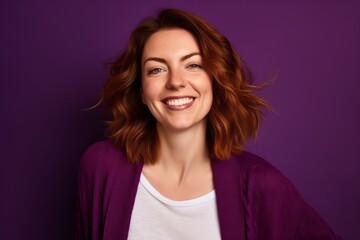 Fototapeta premium Close-up portrait photography of a happy girl in her 30s wearing a chic cardigan against a vibrant purple background. With generative AI technology