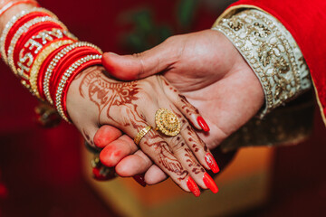 Bride and Groom Holding Hands