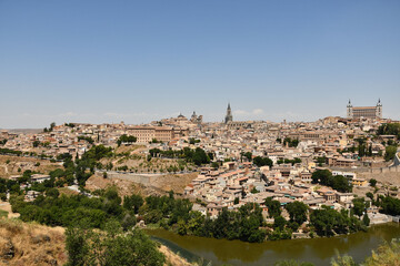 Fototapeta na wymiar Scenic view of the river and old town of Toledo, Spain on a sunny day