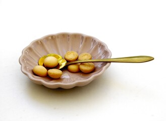 pretty,metalic ornamental small spoon  close up