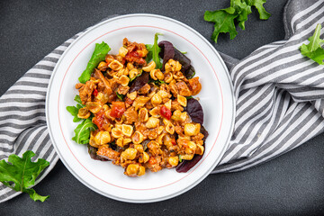 pasta salad tuna and vegetable food healthy meal food vegetables snack on the table copy space food background rustic top view keto or paleo diet pescatarian diet