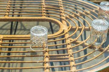 Clean inverted glasses on the table in the cafe.