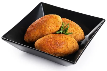 Foto auf Acrylglas Breaded chicken Kiev cutlets. Fried chicken Cordon bleu  in a bowl isolated on white background. © vitals