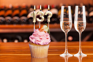 Fototapeta na wymiar Cupcake With Numbers And Glasses With Wine For Birthday Or Anniversary