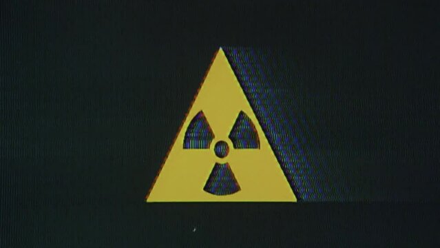 Nuclear warning sign, VHS glitch, radioactive energy glitched analog VHS animated logo, icon animation with trippy particles. 4k Loop motion graphic, pattern distortion.