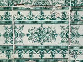 Traditional green and white ornate portuguese decorative tiles azulejos