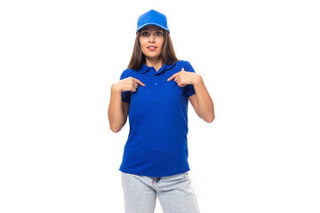 surprised young woman in blue cotton t-shirt and cap with space for print
