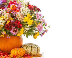 Happy Thanksgiving isolated still life. stylish bouquet of autumn flowers in a decorative vase from an old pumpkin.