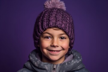 Close-up portrait photography of a satisfied kid male wearing a warm beanie or knit hat against a deep purple background. With generative AI technology
