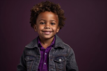 Medium shot portrait photography of a glad kid male wearing a denim jacket against a deep purple background. With generative AI technology