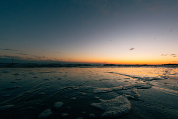 sunset on the beach at Grado city