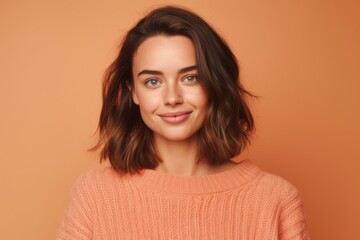 Close-up portrait photography of a tender girl in her 30s wearing a cozy sweater against a pastel orange background. With generative AI technology