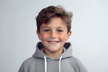 Medium shot portrait photography of a grinning boy in his 30s wearing a stylish hoodie against a pearl white background. With generative AI technology