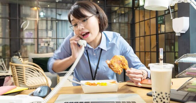 asian businesswoman eat lunch