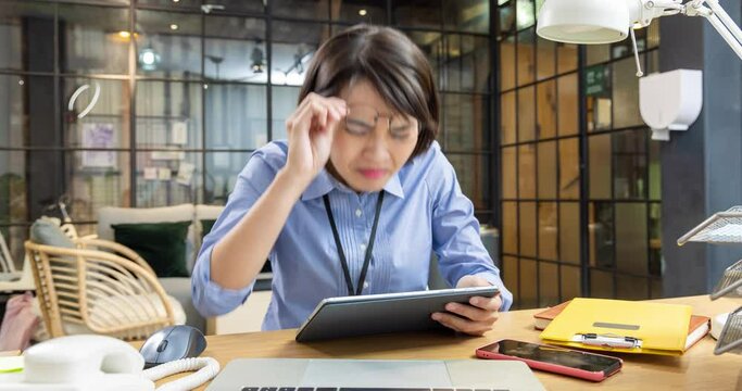 woman eyes pain at work