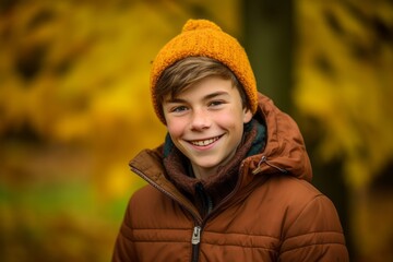 Sports portrait photography of a grinning boy in his 30s wearing a cozy winter coat against an autumn foliage background. With generative AI technology