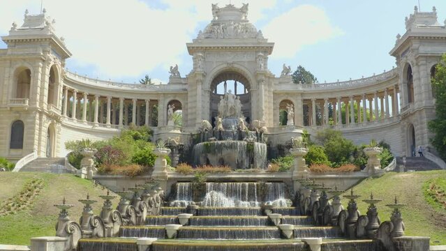 Aerial shot of the Palais Longchamp with its statues and fountains, in Marseille, France