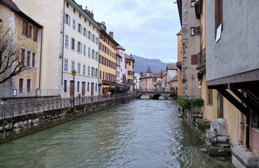 Fototapeta na wymiar Annecy, France: Old town landmark in Annecy city center on the bank of the Thiou river, France