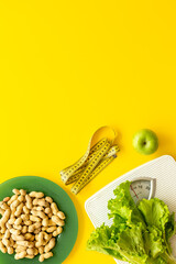 Floor weight scales and healthy diet food for body weight control, top view