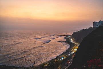Orange Sunset in la Costa Verde (Green Coast) in Lima, Peru - 623464462