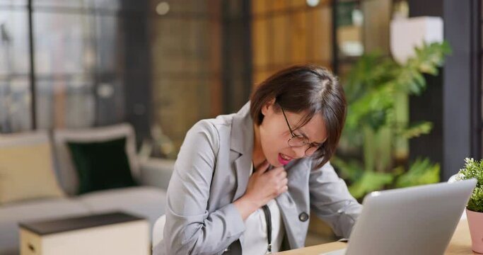 businesswoman have heart attack