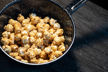 FRESH POPPED CARAMEL CORN WITH PEANUTS
