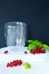  double glass with red currant berries, basil