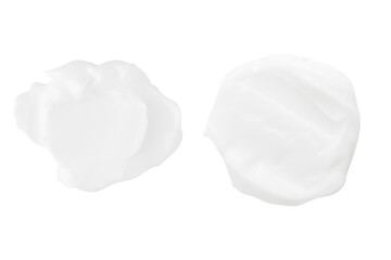 A set of different strokes of white cream on a blank background. PNG