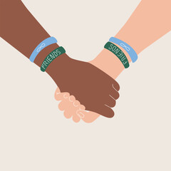 Friendship day banner with two person holding hands with colored bracelets on a white background with copy space