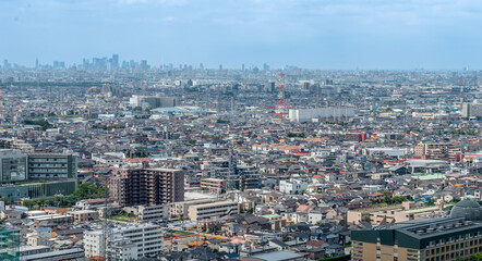 Fototapeta na wymiar 埼玉県草加市の市街地　東京都心のビル群を望む　ドローン　空撮