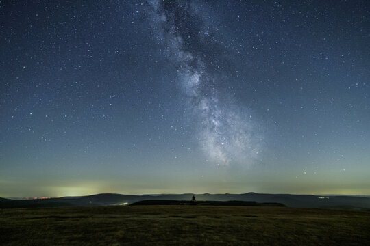 German night sky with milky way around a mountain called Wasserkuppe