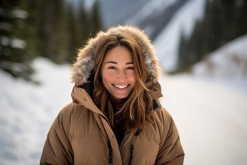 Fototapeta na wymiar Sports portrait photography of a happy girl in her 30s wearing a warm parka against a serene snow-capped mountain background. With generative AI technology