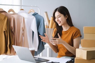 Asian vlogger woman influencer, SME retail store owner smile enjoy selling show live sale online...