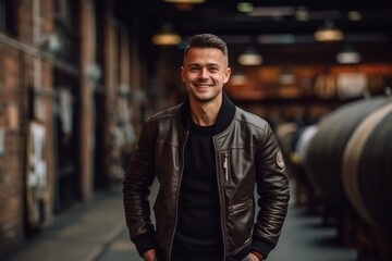 Fototapeta na wymiar Sports portrait photography of a glad boy in his 30s wearing a sleek bomber jacket against a lively brewery background. With generative AI technology