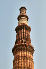 Qutb Minar minaret tower part Qutb complex in South Delhi, India, big red sandstone minaret tower...