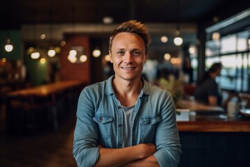 Eclectic portrait photography of a grinning boy in his 30s wearing a casual t-shirt against a bustling cafe background. With generative AI technology