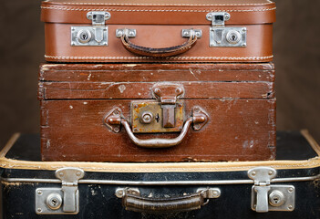 Set of old vintage retro suitcases. Travel, vacation or journey background.