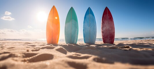 Closeup of Four Surfboards in the Sand - Sunlit Beach Vibes