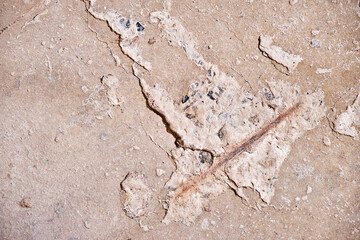 A gray concrete wall in which the fittings are visible. Texture, background. High resolution.