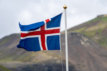 Iceland flag blowing in the wind on an overcast day