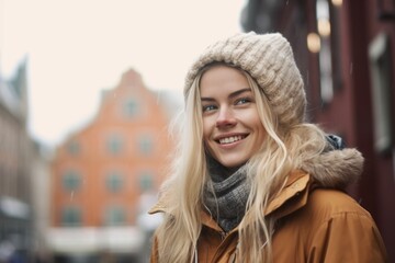 Close-up portrait photography of a grinning girl in her 30s wearing a warm parka against a picturesque old town background. With generative AI technology