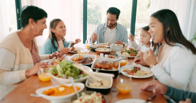 Children, parents and grandparents eating at thanksgiving together as a family for bonding in celebration. Love, lunch or brunch food with kids and relatives at the dining room table during a holiday