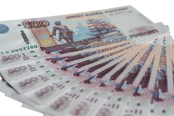 a lot of 500 banknotes of Bank of Russia on white background Russian rubles spine of five hundred rubles