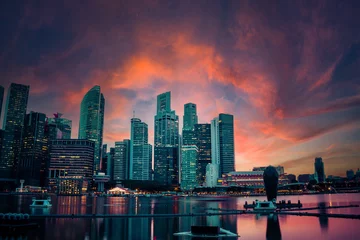 Zelfklevend Fotobehang Singapore Skyline in the evening with a dramatic sunset. © Jason Yoder