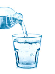 pouring water on a glass on white background