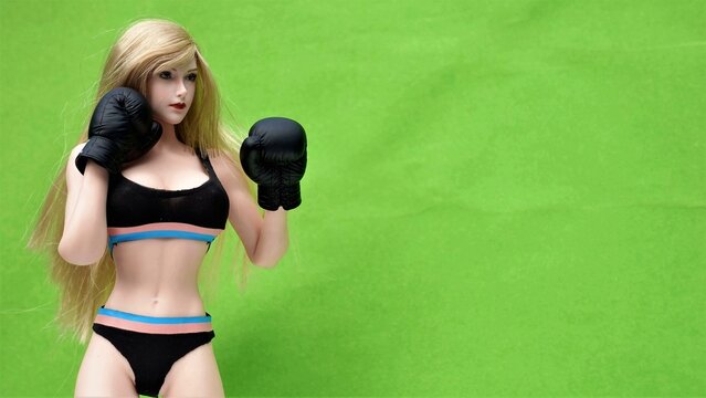 Beautiful girl model in Boxing Gloves &ndash; Women's Boxing, Women's fights, boxing girl model. Fitness model, athletic figure, women's sportswear, sportswear style
