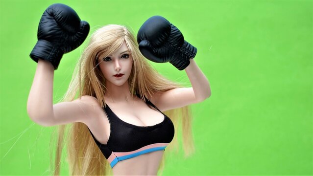Beautiful girl model in Boxing Gloves &ndash; Women's Boxing, Women's fights, boxing girl model. Fitness model, athletic figure, women's sportswear, sportswear style
