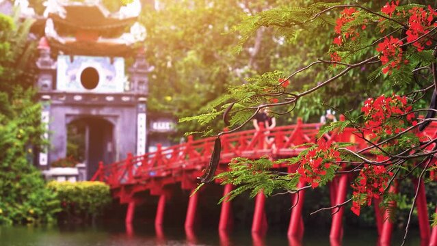 view of The Huc Red Bridge and Turtle Tower in the center of Hoan Kiem Lake, Ha Noi, Vietnam