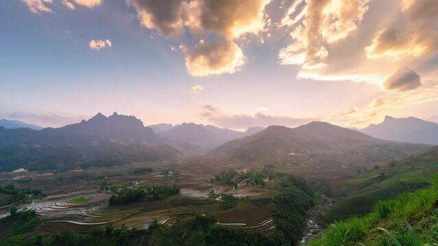 Aerial view of the water season makes the terraced fields of Y Ty commune, Lao Cai province, Vietnam appear with brown soil blending with the beautiful sky.