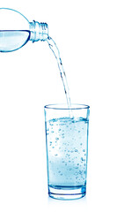 pouring water on a glass on white background